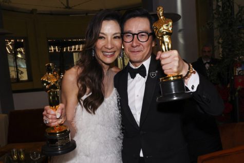 Best Supporting Actor Ke Huy Quan and Best Actress Michelle Yeoh pose with their awards at the Governors Ball following the Oscars show at the 95th Academy Awards in Hollywood, Los Angeles, California, U.S., March 12, 2023. REUTERS/Mario Anzuoni