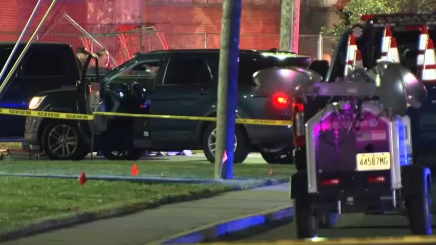 Police vehicles gathered around a crashed Kia Soul in an industrial area of Moonachie, New Jersey