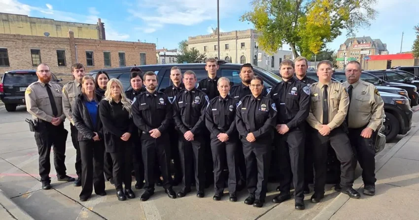 Law enforcement officers gather at a funeral service for Deputy Katherine Frank in Sioux Falls